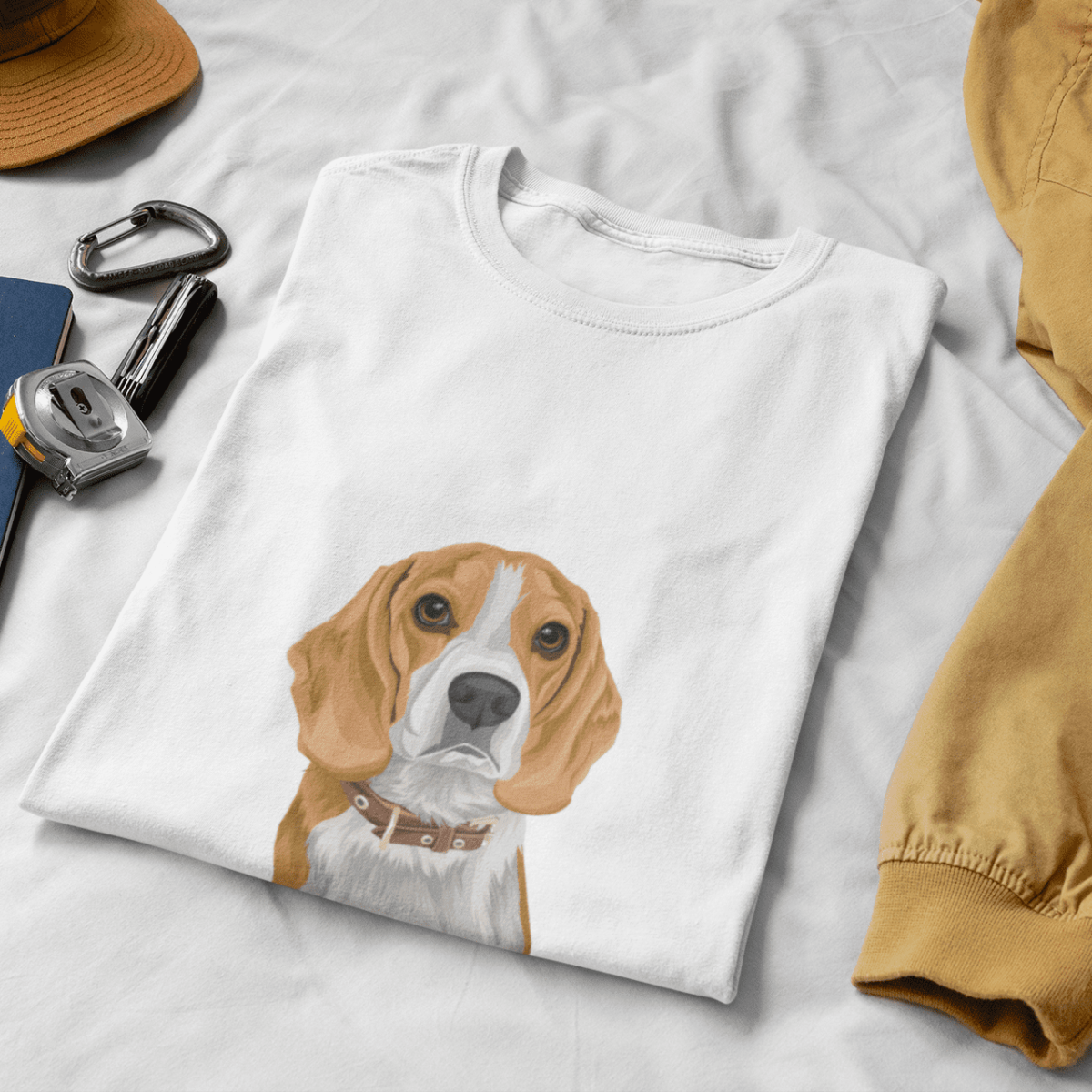 mockup of a folded t shirt on a bed with some working tools 33921 1