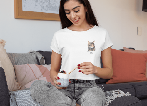 crop-top-tee-mockup-featuring-a-young-woman-eating-at-home-32759-square